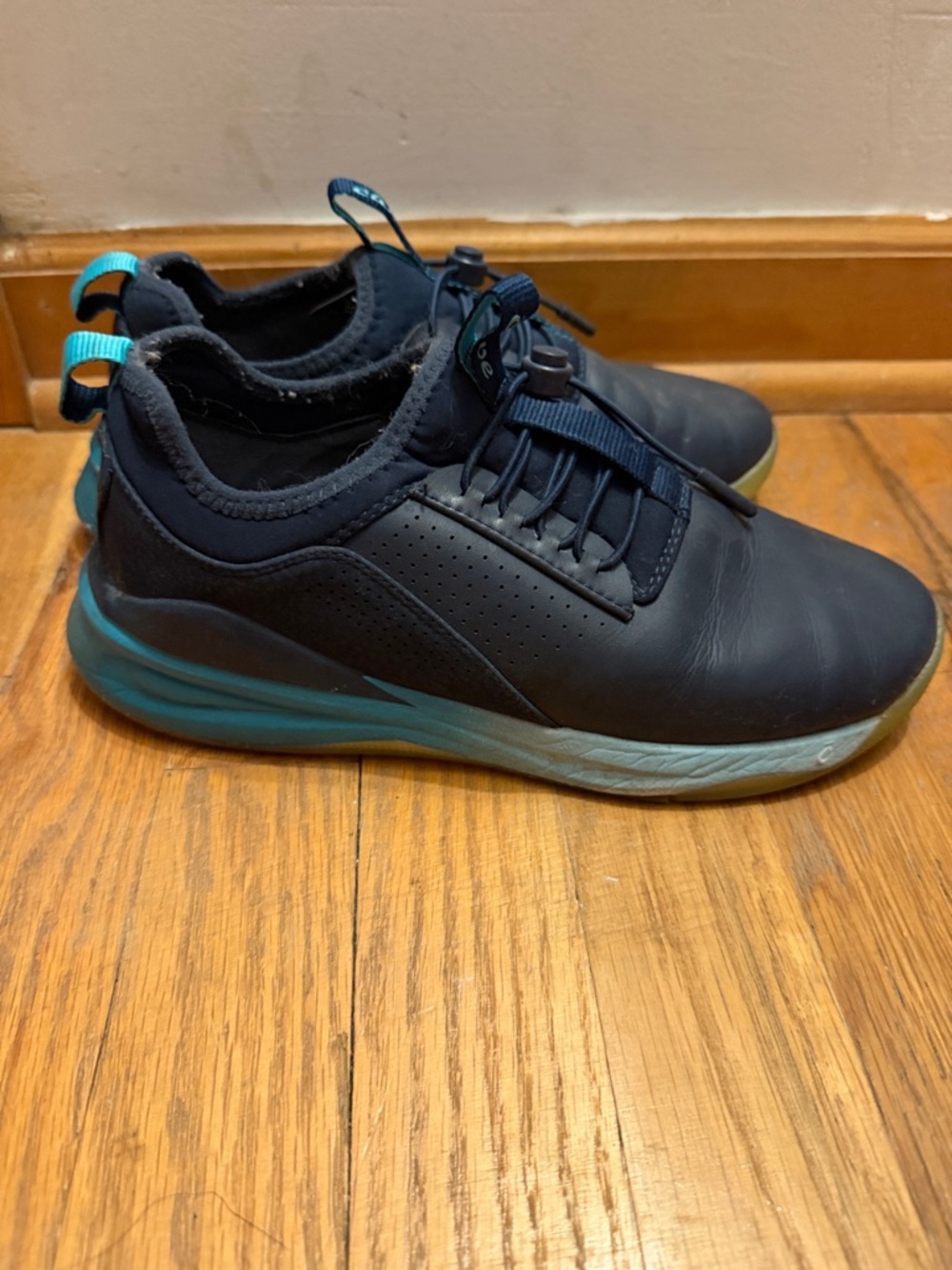 Women’s Navy Slip-On Sneakers with Teal Accents